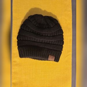 Women's black winter cable knit hat. Brand new
